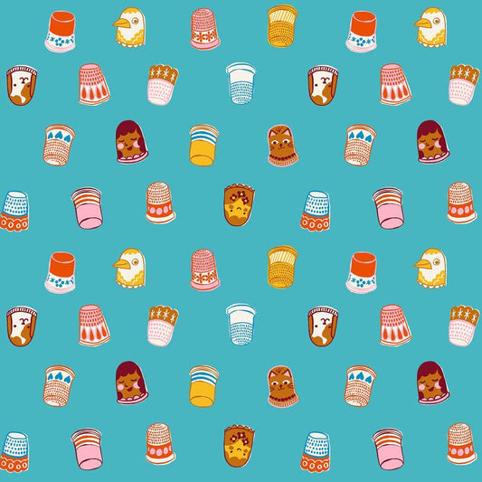 Image of 1 800 Notion Thimbles Turquoise quilting cotton fabric by Ruby Star Society for Moda Fabrics. Features sewing accessories on a blue background. Cute Little Fabrics Shop.