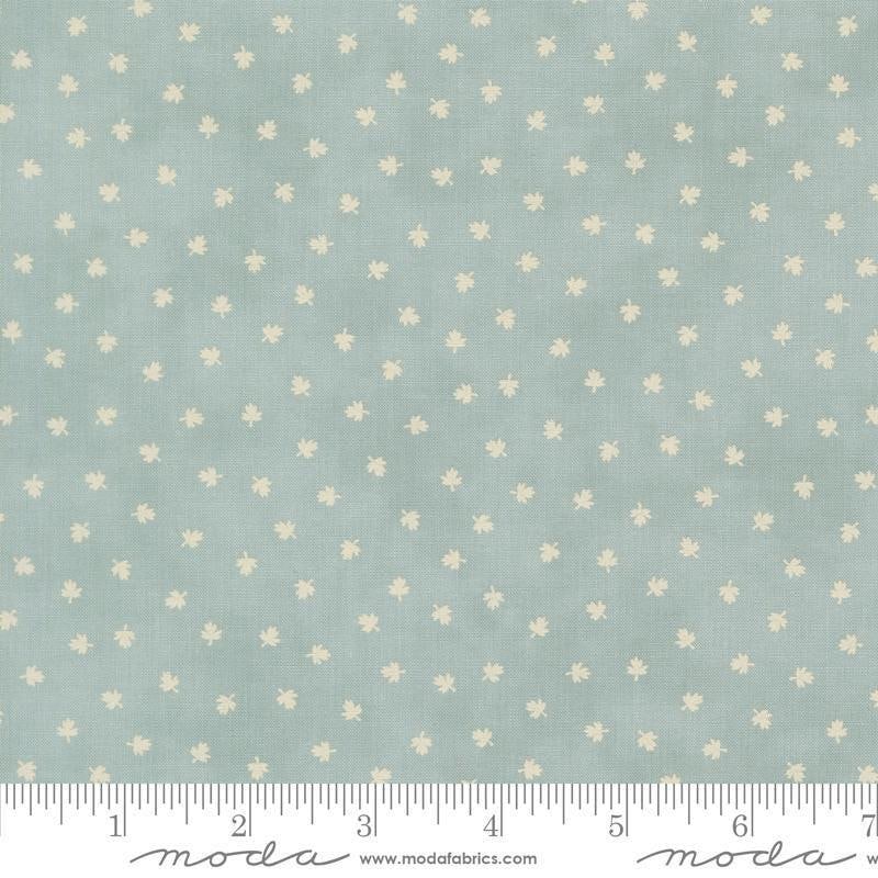 Image of Breathtaking Blues Tiny Leaf Sky quilting cotton fabric by 3 Sisters for Moda Fabrics. Features leaves on a blue background. Cute Little Fabric Shop.