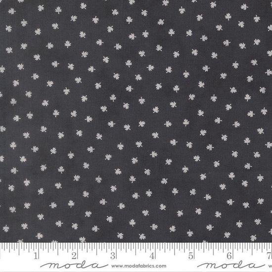 Image of Breathtaking Blues Tiny Leaf Midnight quilting cotton fabric by 3 Sisters for Moda Fabrics. Features leaves on a black background. Cute Little Fabric Shop.