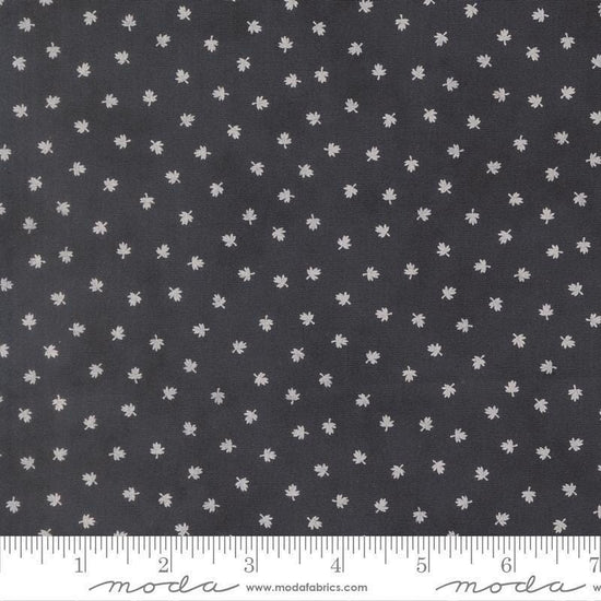 Image of Breathtaking Blues Tiny Leaf Midnight quilting cotton fabric by 3 Sisters for Moda Fabrics. Features leaves on a black background. Cute Little Fabric Shop.