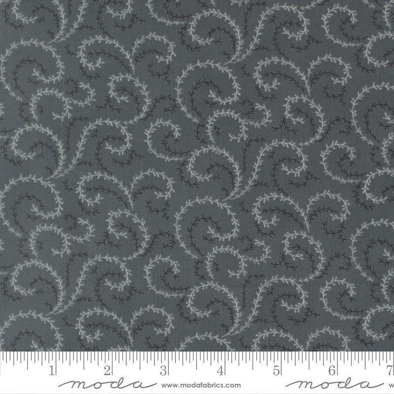 Image of Breathtaking Blues Vine Dusk quilting cotton fabric by 3 Sisters for Moda Fabrics. Features leaves on a dark gray background. Cute Little Fabric Shop.