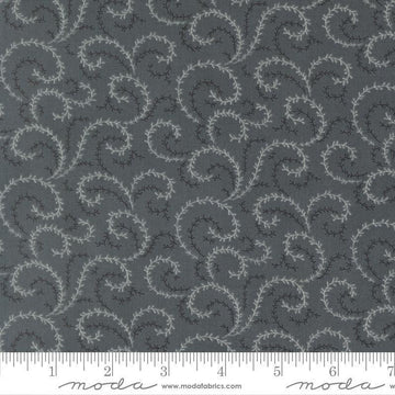 Image of Breathtaking Blues Vine Dusk quilting cotton fabric by 3 Sisters for Moda Fabrics. Features leaves on a dark gray background. Cute Little Fabric Shop.