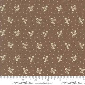 Image of Butternut and Sage Acorn Medley Walnut quilting cotton fabric by Fig Tree Co for Moda Fabrics. Features acorns and dots on a brown background. Cute Little Fabric Shop.