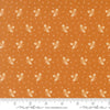 Image of Butternut and Sage Acorn Medley Butterscotch quilting cotton fabric by Fig Tree Co for Moda Fabrics. Features acorns and dots on an orange background. Cute Little Fabric Shop.