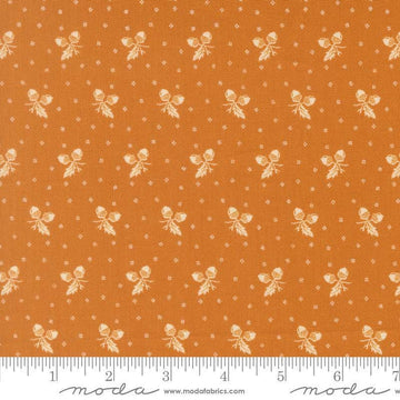 Image of Butternut and Sage Acorn Medley Butterscotch quilting cotton fabric by Fig Tree Co for Moda Fabrics. Features acorns and dots on an orange background. Cute Little Fabric Shop.