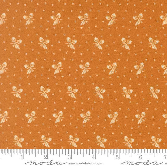 Image of Butternut and Sage Acorn Medley Butterscotch quilting cotton fabric by Fig Tree Co for Moda Fabrics. Features acorns and dots on an orange background. Cute Little Fabric Shop.