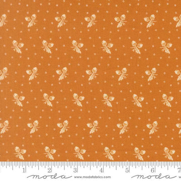 Image of Butternut and Sage Acorn Medley Butterscotch quilting cotton fabric by Fig Tree Co for Moda Fabrics. Features acorns and dots on an orange background. Cute Little Fabric Shop.