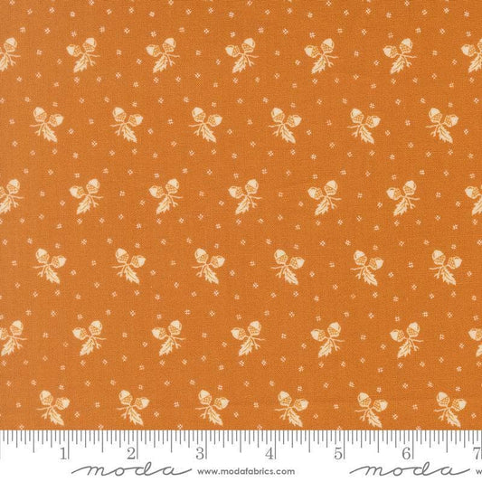 Image of Butternut and Sage Acorn Medley Butterscotch quilting cotton fabric by Fig Tree Co for Moda Fabrics. Features acorns and dots on an orange background. Cute Little Fabric Shop.