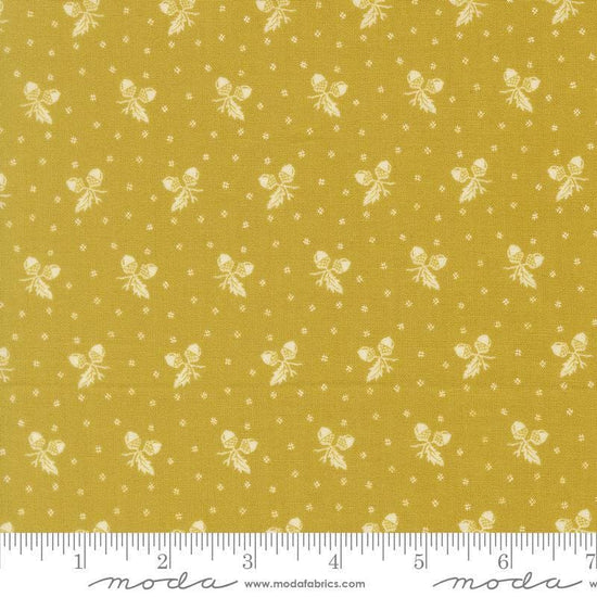 Image of Butternut and Sage Acorn Medley Citron quilting cotton fabric by Fig Tree Co for Moda Fabrics. Features acorns and dots on a green background. Cute Little Fabric Shop.