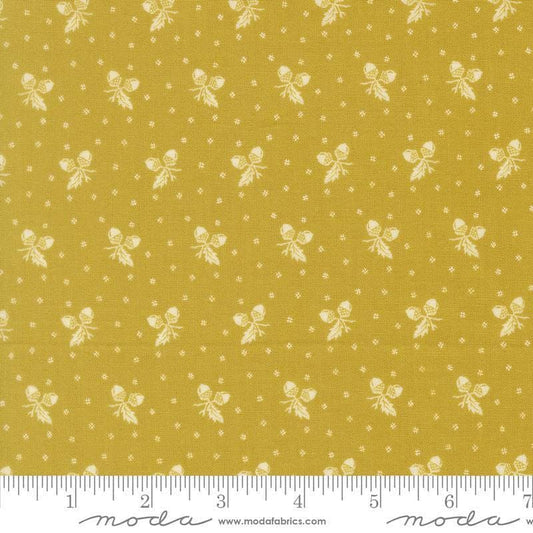 Image of Butternut and Sage Acorn Medley Citron quilting cotton fabric by Fig Tree Co for Moda Fabrics. Features acorns and dots on a green background. Cute Little Fabric Shop.