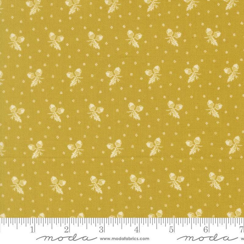 Image of Butternut and Sage Acorn Medley Citron quilting cotton fabric by Fig Tree Co for Moda Fabrics. Features acorns and dots on a green background. Cute Little Fabric Shop.