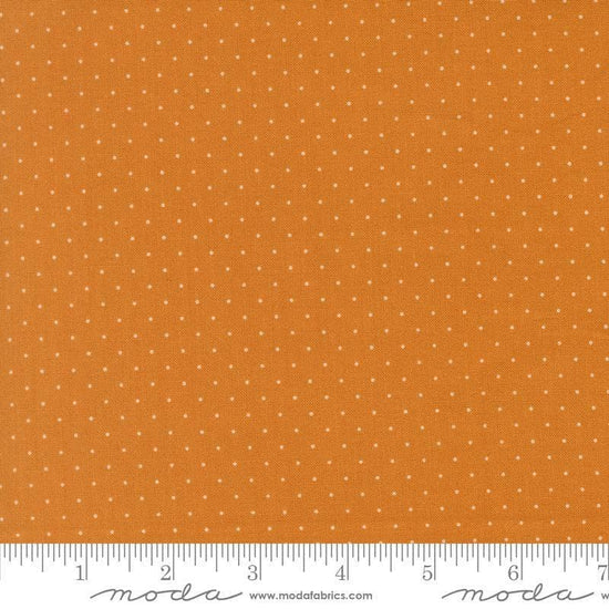 Image of Butternut and Sage Pindot Butterscotch quilting cotton fabric by Fig Tree Co for Moda Fabrics. Features polka dots on an orange background. Cute Little Fabric Shop.