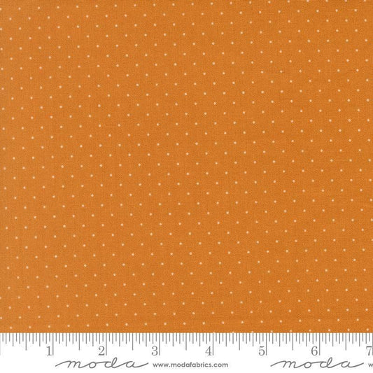 Image of Butternut and Sage Pindot Butterscotch quilting cotton fabric by Fig Tree Co for Moda Fabrics. Features polka dots on an orange background. Cute Little Fabric Shop.