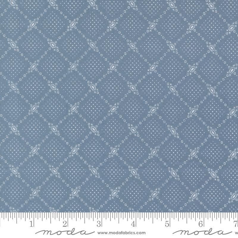 Image of Butternut and Sage Autumn Trellis Dusk quilting cotton fabric by Fig Tree Co for Moda Fabrics. Features a geometric pattern on a blue background. Cute Little Fabric Shop.