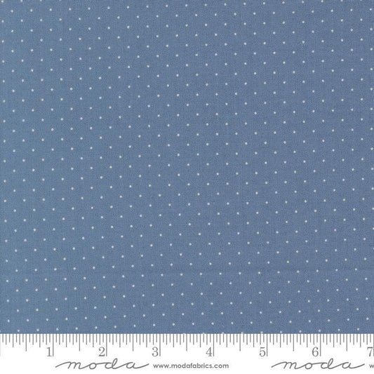 Image of Butternut and Sage Pindot Dusk quilting cotton fabric by Fig Tree Co for Moda Fabrics. Features polka dots on a blue background. Cute Little Fabric Shop.