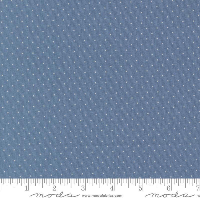 Image of Butternut and Sage Pindot Dusk quilting cotton fabric by Fig Tree Co for Moda Fabrics. Features polka dots on a blue background. Cute Little Fabric Shop.