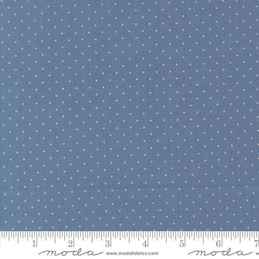 Image of Butternut and Sage Pindot Dusk quilting cotton fabric by Fig Tree Co for Moda Fabrics. Features polka dots on a blue background. Cute Little Fabric Shop.