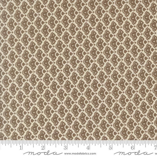 Image of Butternut and Sage Cobblestones Walnut quilting cotton fabric by Fig Tree Co for Moda Fabrics. Features a geometric pattern on a brown background. Cute Little Fabric Shop.