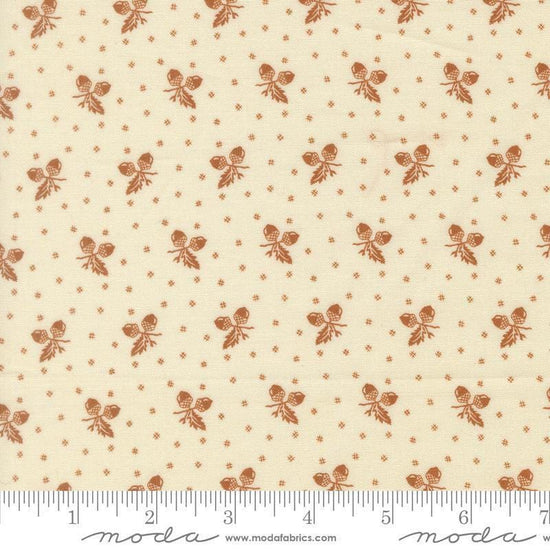 Image of Butternut and Sage Acorn Medley Cream Cinnamon quilting cotton fabric by Fig Tree Co for Moda Fabrics. Features acorns and dots on a cream background. Cute Little Fabric Shop.