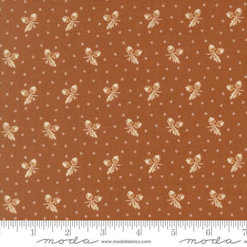 Image of Butternut and Sage Acorn Medley Cinnamon quilting cotton fabric by Fig Tree Co for Moda Fabrics. Features acorns and dots on a brown background. Cute Little Fabric Shop.