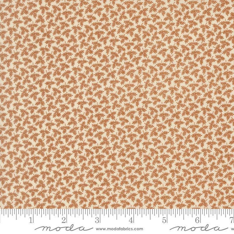 Image of Butternut and Sage Fall Foliage Cinnamon quilting cotton fabric by Fig Tree Co for Moda Fabrics. Features leaves on a brown background. Cute Little Fabric Shop.
