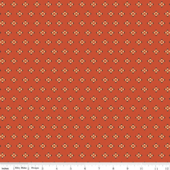 Image of Cozy Autumn Tiny Acorns Rusty quilting cotton fabric by Beverly McCullough for Riley Blake Designs. Features tiny acorns on an orange background. Cute Little Fabric Shop.