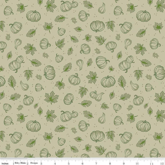 Image of Cozy Autumn Pumpkins Meadow quilting cotton fabric by Beverly McCullough for Riley Blake Designs. Features pumpkins and leaves on a green background. Cute Little Fabric Shop.