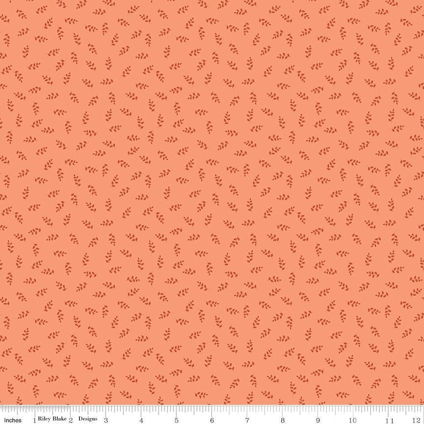 Image of Cozy Autumn Vines Melon quilting cotton fabric by Beverly McCullough for Riley Blake Designs. Features leaves on a pinky orange background. Cute Little Fabric Shop.