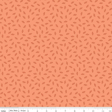 Image of Cozy Autumn Vines Melon quilting cotton fabric by Beverly McCullough for Riley Blake Designs. Features leaves on a pinky orange background. Cute Little Fabric Shop.