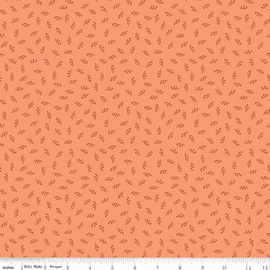 Image of Cozy Autumn Vines Melon quilting cotton fabric by Beverly McCullough for Riley Blake Designs. Features leaves on a pinky orange background. Cute Little Fabric Shop.