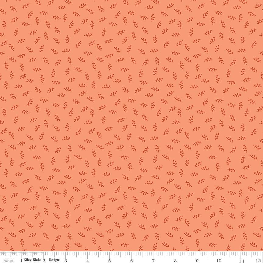 Image of Cozy Autumn Vines Melon quilting cotton fabric by Beverly McCullough for Riley Blake Designs. Features leaves on a pinky orange background. Cute Little Fabric Shop.