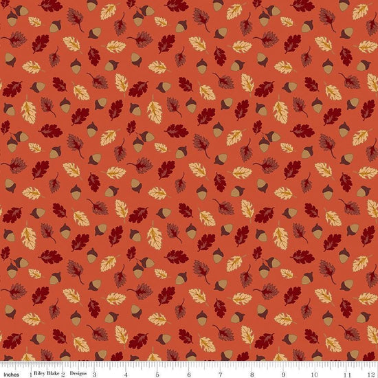 Image of Cozy Autumn Acorns & Oak Leaves Rusty quilting cotton fabric by Beverly leaves and acorns for Riley Blake Designs. Features leaves and acorns on an orange background. Cute Little Fabric Shop.