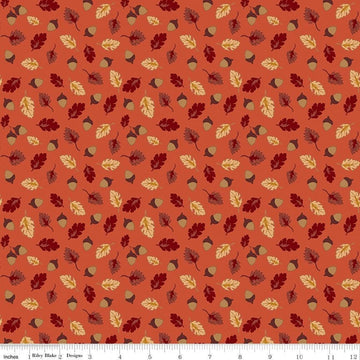 Image of Cozy Autumn Acorns & Oak Leaves Rusty quilting cotton fabric by Beverly leaves and acorns for Riley Blake Designs. Features leaves and acorns on an orange background. Cute Little Fabric Shop.