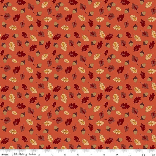 Image of Cozy Autumn Acorns & Oak Leaves Rusty quilting cotton fabric by Beverly leaves and acorns for Riley Blake Designs. Features leaves and acorns on an orange background. Cute Little Fabric Shop.