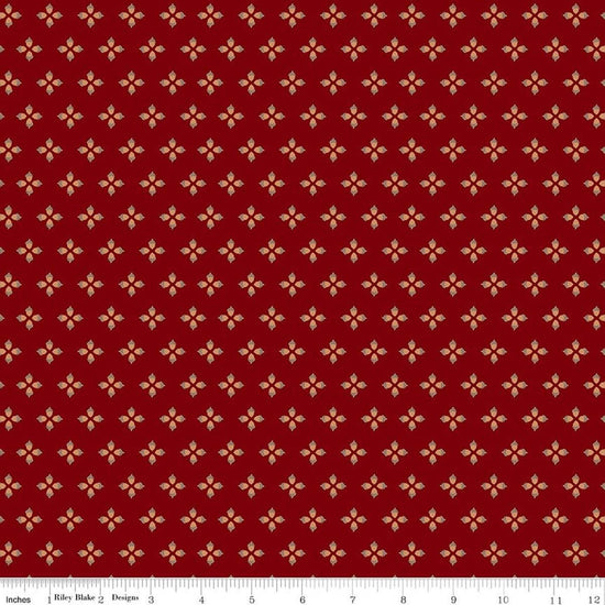 Image of Cozy Autumn Tiny Acorns Mahogany quilting cotton fabric by Beverly McCullough for Riley Blake Designs. Features tiny acorns on a red background. Cute Little Fabric Shop.