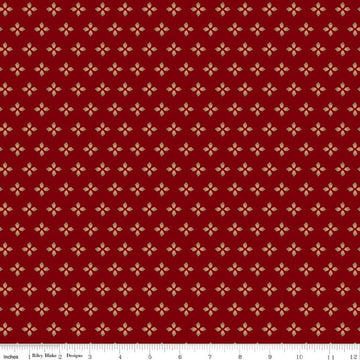 Image of Cozy Autumn Tiny Acorns Mahogany quilting cotton fabric by Beverly McCullough for Riley Blake Designs. Features tiny acorns on a red background. Cute Little Fabric Shop.