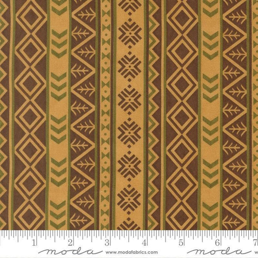 Image of Northwoods Lodge Northwest Stripes Fawn quilting cotton fabric by Deb Strain for Moda Fabrics. Features geometric stripes on a brown background. Cute Little Fabric Shop.