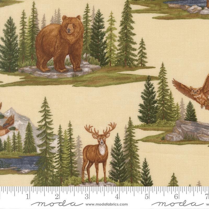 Image of Northwoods Lodge Allover Natural quilting cotton fabric by Deb Strain for Moda Fabrics. Features forests and animals on a cream background. Cute Little Fabric Shop.