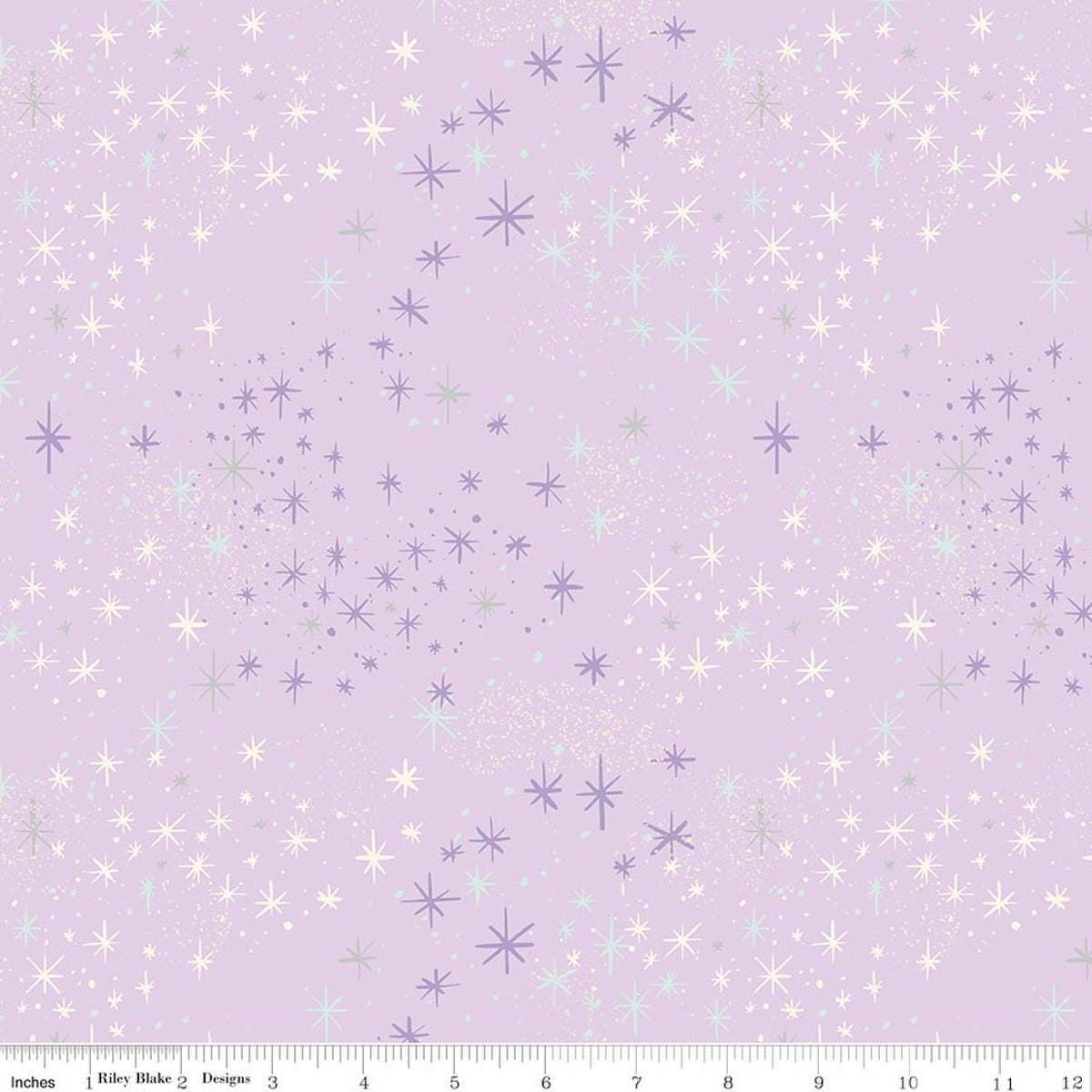 Image of Wishes Magic Vanity Sparkle quilting cotton fabric by Jill Howarth for Riley Blake Designs. Features stars on a purple background. Cute Little Fabric Shop.