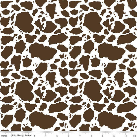 Image of The Homestead Cow Patches Brown quilting cotton fabric by Tara Reed for Riley Blake Designs. Features cow print on a brown background. Cute Little Fabric Shop.