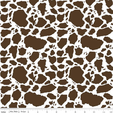 Image of The Homestead Cow Patches Brown quilting cotton fabric by Tara Reed for Riley Blake Designs. Features cow print on a brown background. Cute Little Fabric Shop.