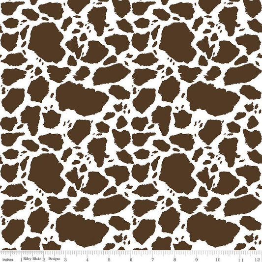 Image of The Homestead Cow Patches Brown quilting cotton fabric by Tara Reed for Riley Blake Designs. Features cow print on a brown background. Cute Little Fabric Shop.