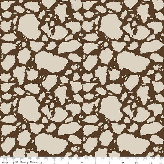 Image of The Homestead Cow Patches Tan quilting cotton fabric by Tara Reed for Riley Blake Designs. Features cow print on a brown background. Cute Little Fabric Shop.