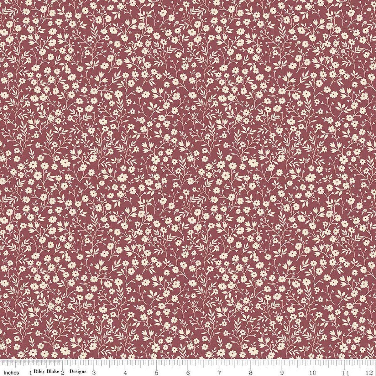 Image of Harvest on the Prairie Ditsy Wine quilting cotton fabric by Modern Prairie for Riley Blake Designs. Features flowers on a purple background. Cute Little Fabric Shop.