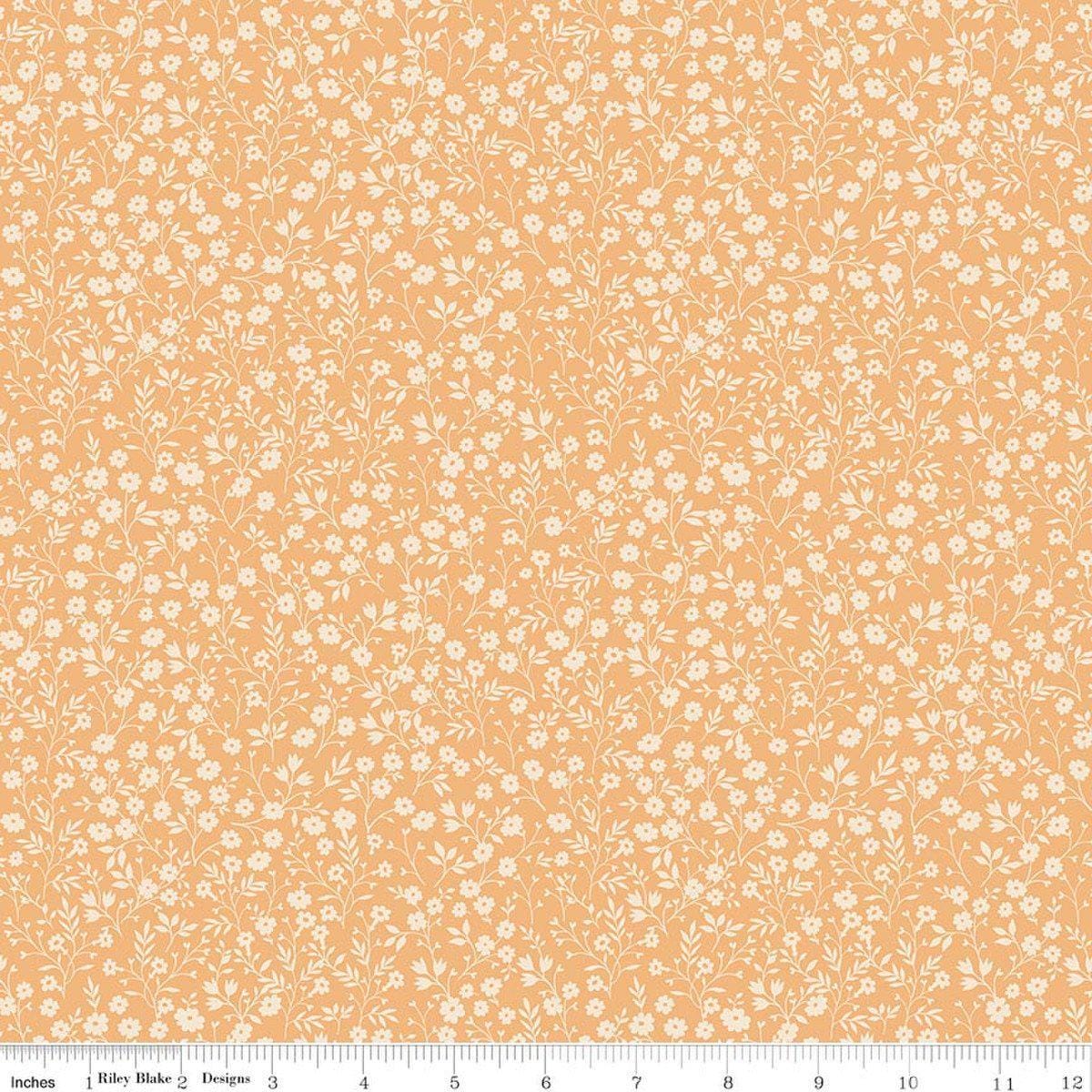 Image of Harvest on the Prairie Ditsy Marmalade quilting cotton fabric by Modern Prairie for Riley Blake Designs. Features flowers on a yellow background. Cute Little Fabric Shop.