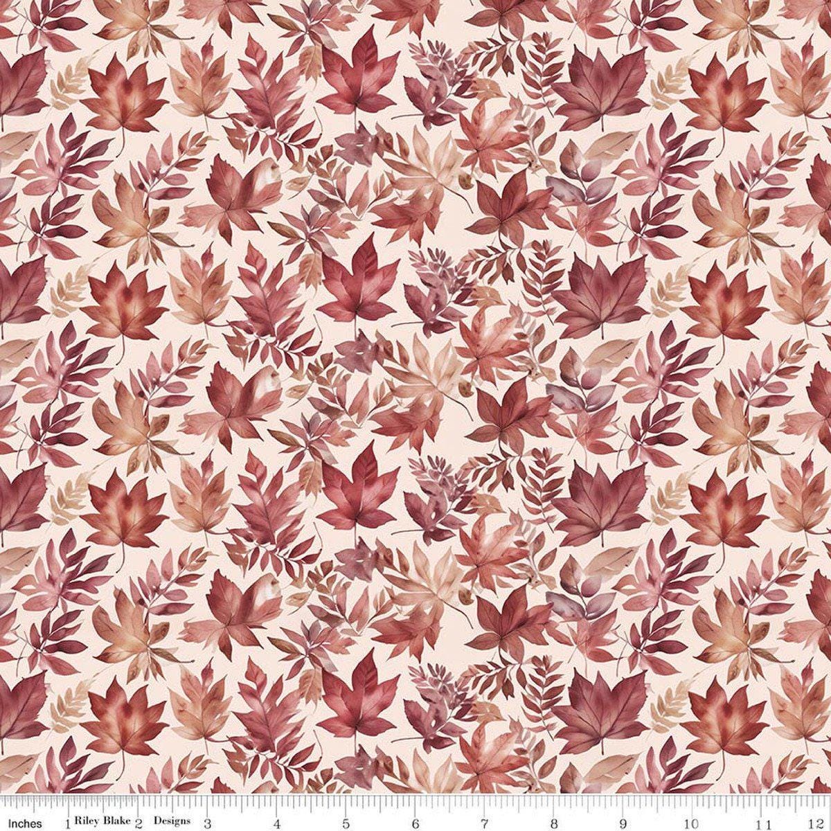 Image of Harvest on the Prairie Leaves Latte quilting cotton fabric by Modern Prairie for Riley Blake Designs. Features leaves on a white background. Cute Little Fabric Shop.