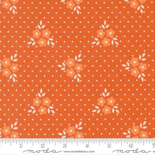 Image of Birch and Willow Autumn Spice quilting cotton fabric by Sherri & Chelsi for Moda Fabrics. Features flowers and dots on an orange background. Cute Little Fabric Shop.