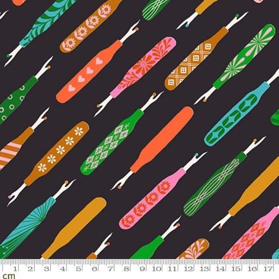Image of 1 800 Notion Seam Rippers Soft Black quilting cotton fabric by Ruby Star Society for Moda Fabrics. Features sewing accessories on a black background. Cute Little Fabrics Shop.