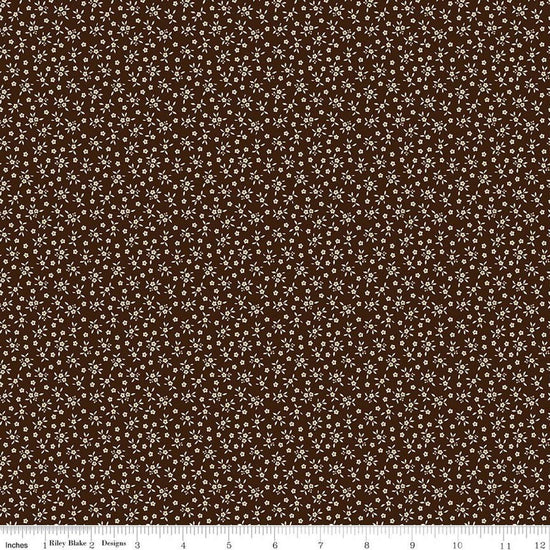 Image of Worth Repeating Ditsy Coffee quilting cotton fabric by Sandy Gervais for Riley Blake Designs. Features flowers on a brown background. Cute Little Fabric Shop.