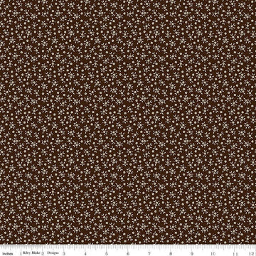 Image of Worth Repeating Ditsy Coffee quilting cotton fabric by Sandy Gervais for Riley Blake Designs. Features flowers on a brown background. Cute Little Fabric Shop.